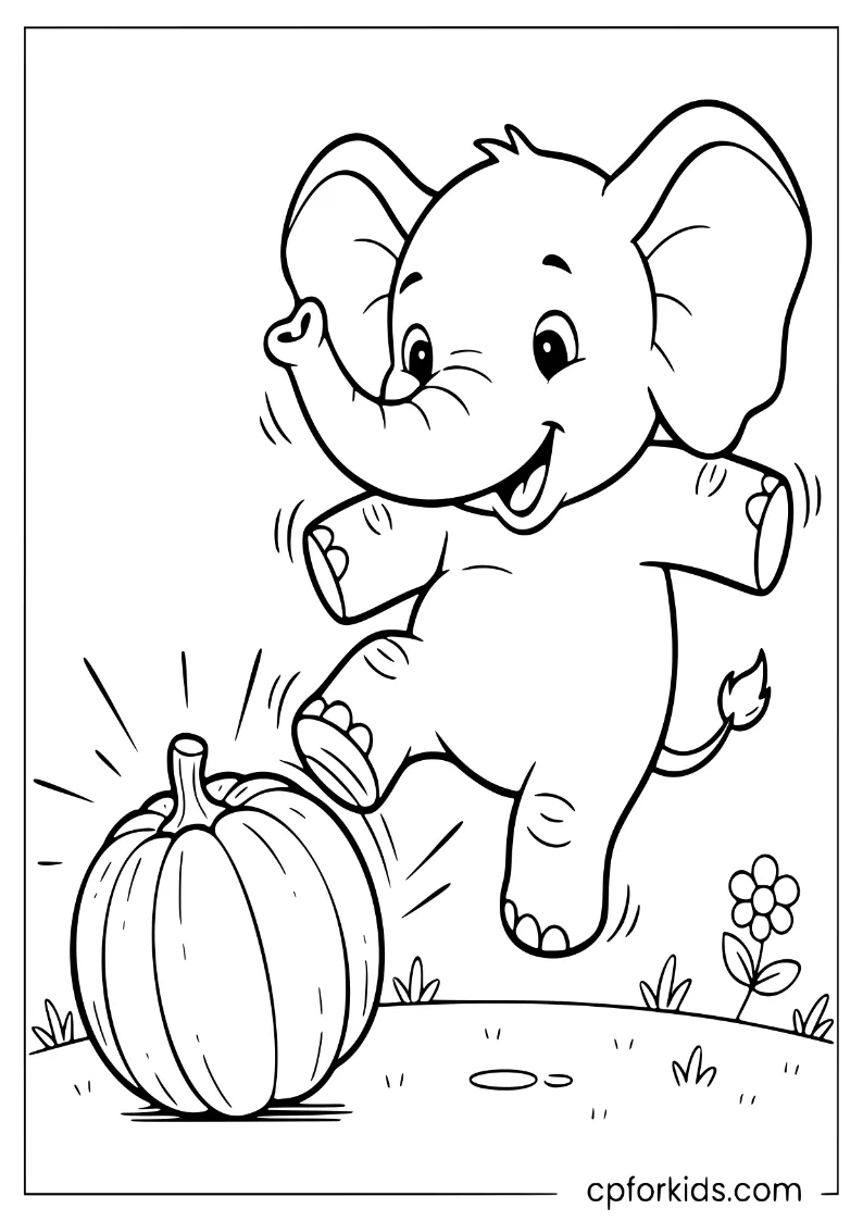 Elephant kicking a pumpkin like a soccer ball
