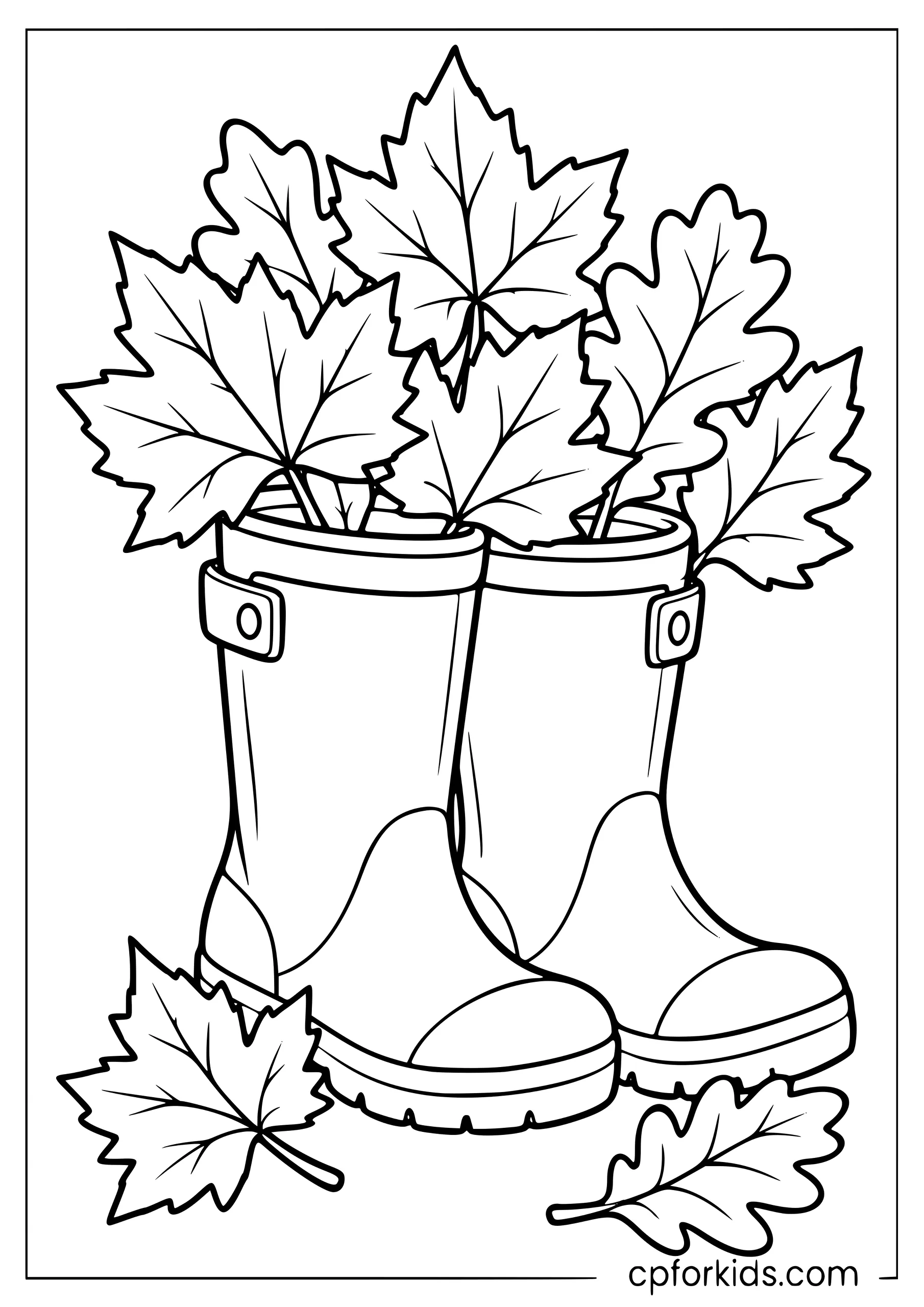 Rain boots filled with large autumn leaves
