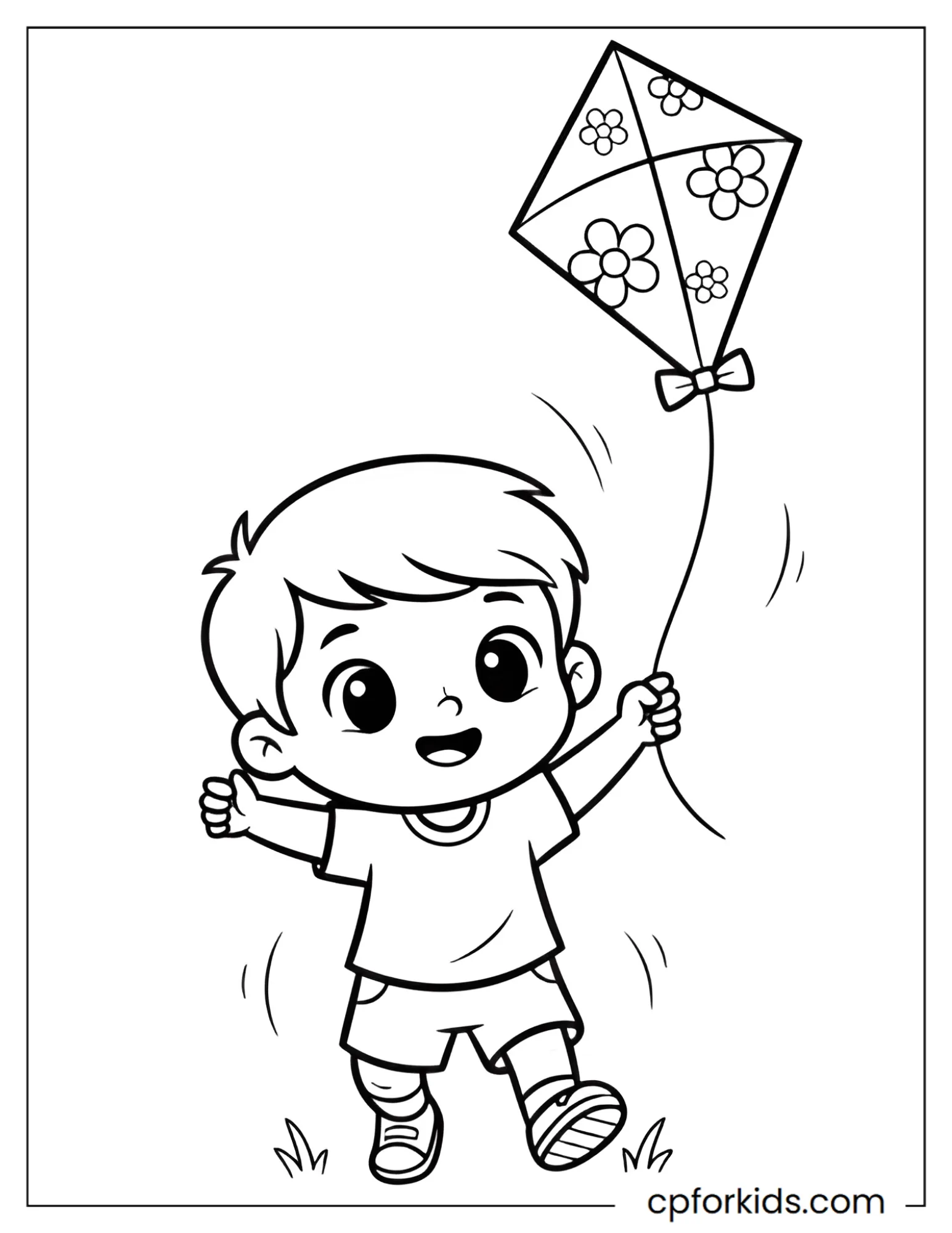 Preschool boy flying a kite in a park full of spring flowers